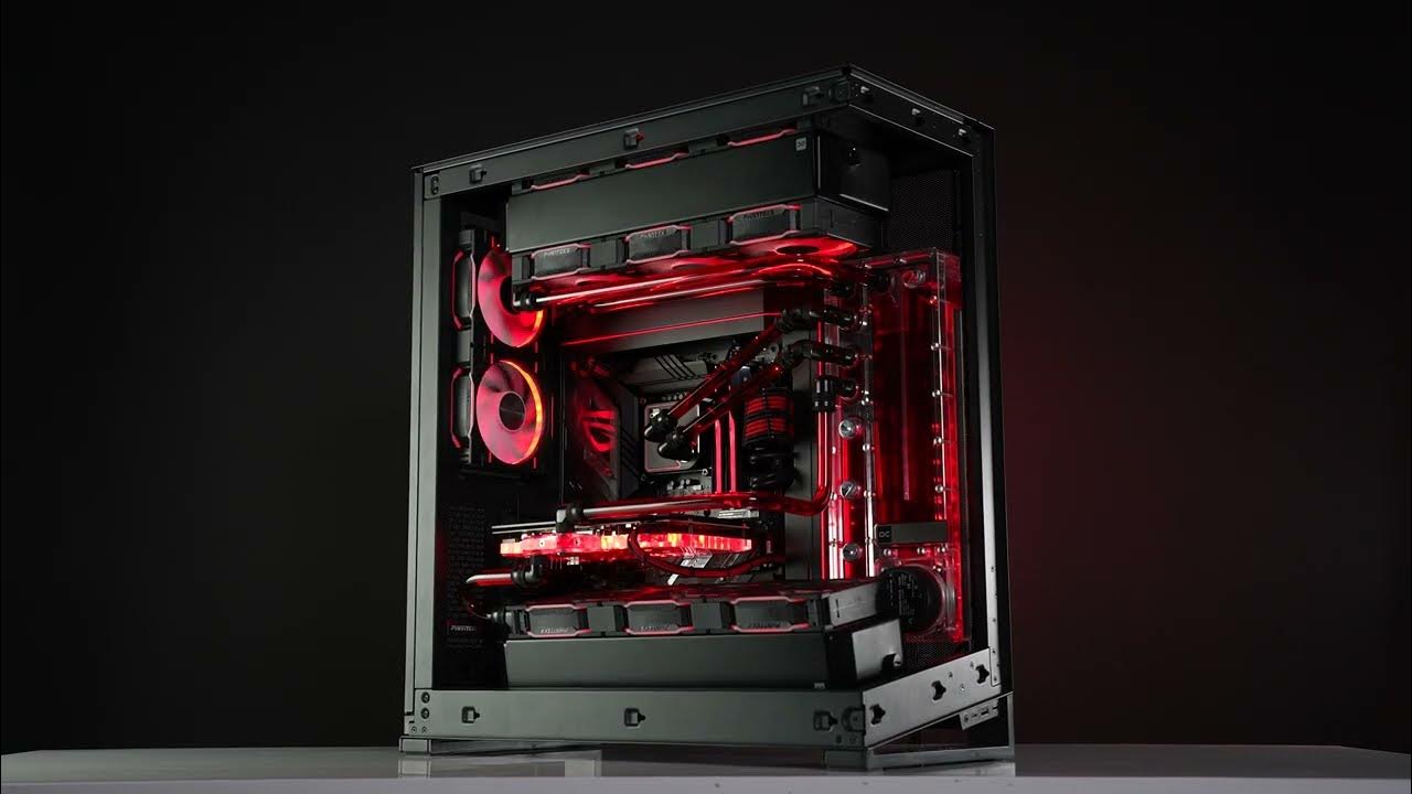 A high-performance gaming PC case with visible internal liquid cooling tubing glowing orange